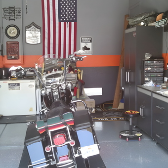 Organized garage with tool chests, cabinets, motorcycle - Larry's Dog House from Pittsburg, CA