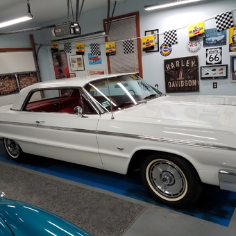 Classic car in decorated garage with vintage signs - Doug from Atlantic Highlands, NJ