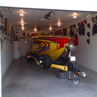 Organized Garage with Racing Boat and Wall Displays - Stephen from Joplin, MO