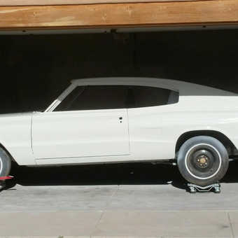 Classic white muscle car on wheel dollies - Mike from Estes Park, CO