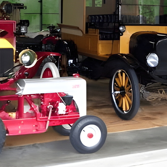 Vintage Cars and Tractor Displayed in Garage - Kent from Milwaukee, WI