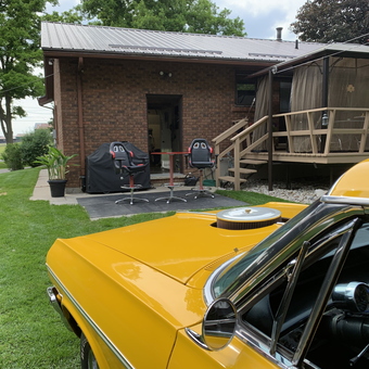 Garage Patio with Racing Bar Stools and Classic Car - Steve from Caledonia