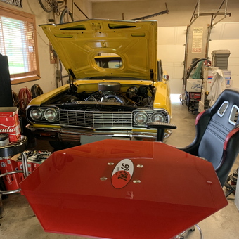 Classic car, racing chair, tool chest in garage - Steve from Caledonia