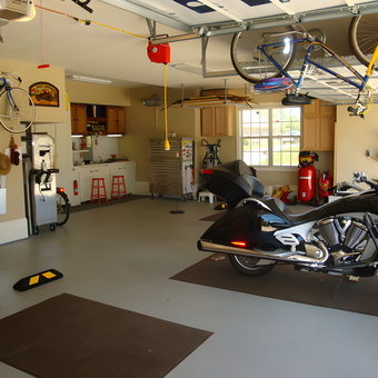 Organized Garage with Motorcycle, Bike Storage, and Cabinets - James from Harvest, AL