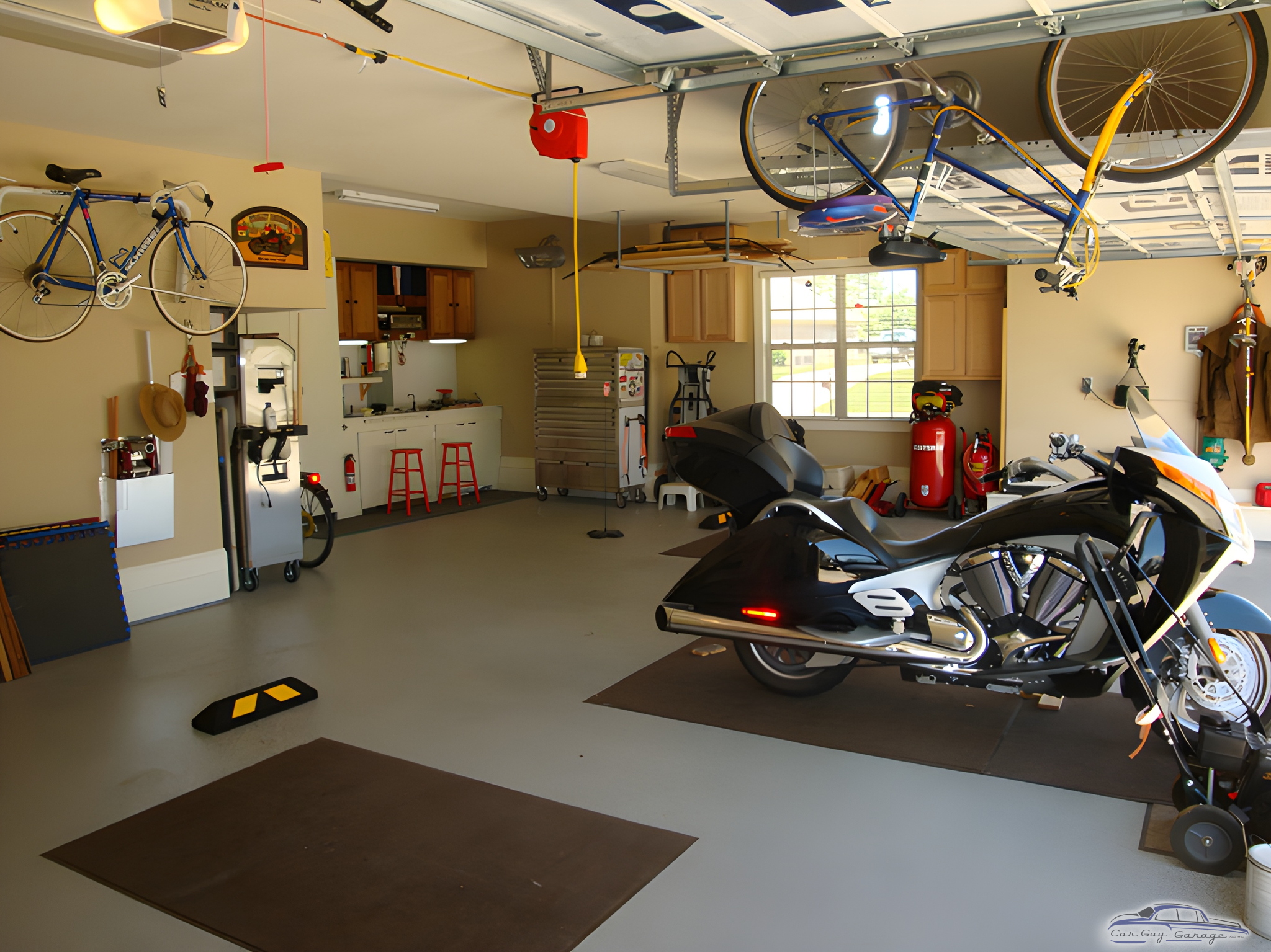 Organized Garage with Motorcycle, Bike Storage, and Cabinets - James from Harvest, AL