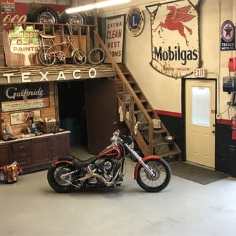 Vintage Garage With Motorcycle and Retro Signs - M from Jamestown, ND