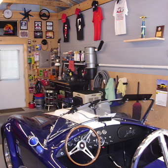 Organized garage with blue classic car and wall decor - Randy from Richmond, VA
