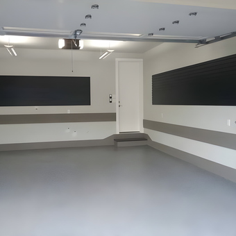Modern garage with slatwall panels and epoxy floor - Peds from Salem, OR