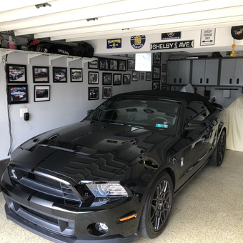 Organized Shelby Garage with Wall Cabinets and Signs - Geo from Pittsburgh, PA
