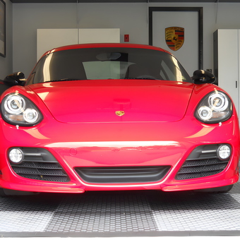 Red sports car in garage with storage cabinets - Jim from Commack, NY