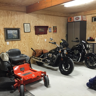 Garage with Motorcycles, Lawn Mower, and Cabinets - Cavedweller from MOBILE, AL