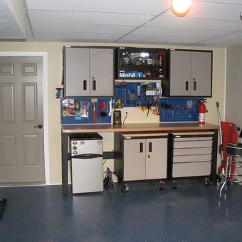 Organized Garage Workbench with Cabinets and Pegboard - Stanley from Blairsville, PA
