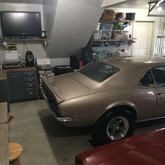 Organized garage with classic cars, cabinets, and TV - Carl from Westbrook, CT