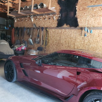 Garage with Red Sports Car, Tools, and Wall Storage - Chris from Munnsville, NY