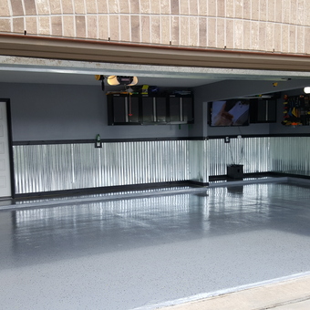 Modern garage with metal wainscoting and cabinets - Mr. Easy from Iowa Colony, TX