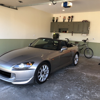 Organized garage with silver convertible and storage cabinets - Muzzy from Romeoville, IL