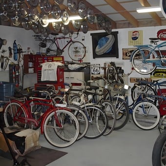 Vintage Bicycles, Hubcaps, and Retro Signs in Garage - Chuck from Gainesville, GA