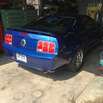 Organized garage with tool chests and blue Mustang - Randy from Houston, PA