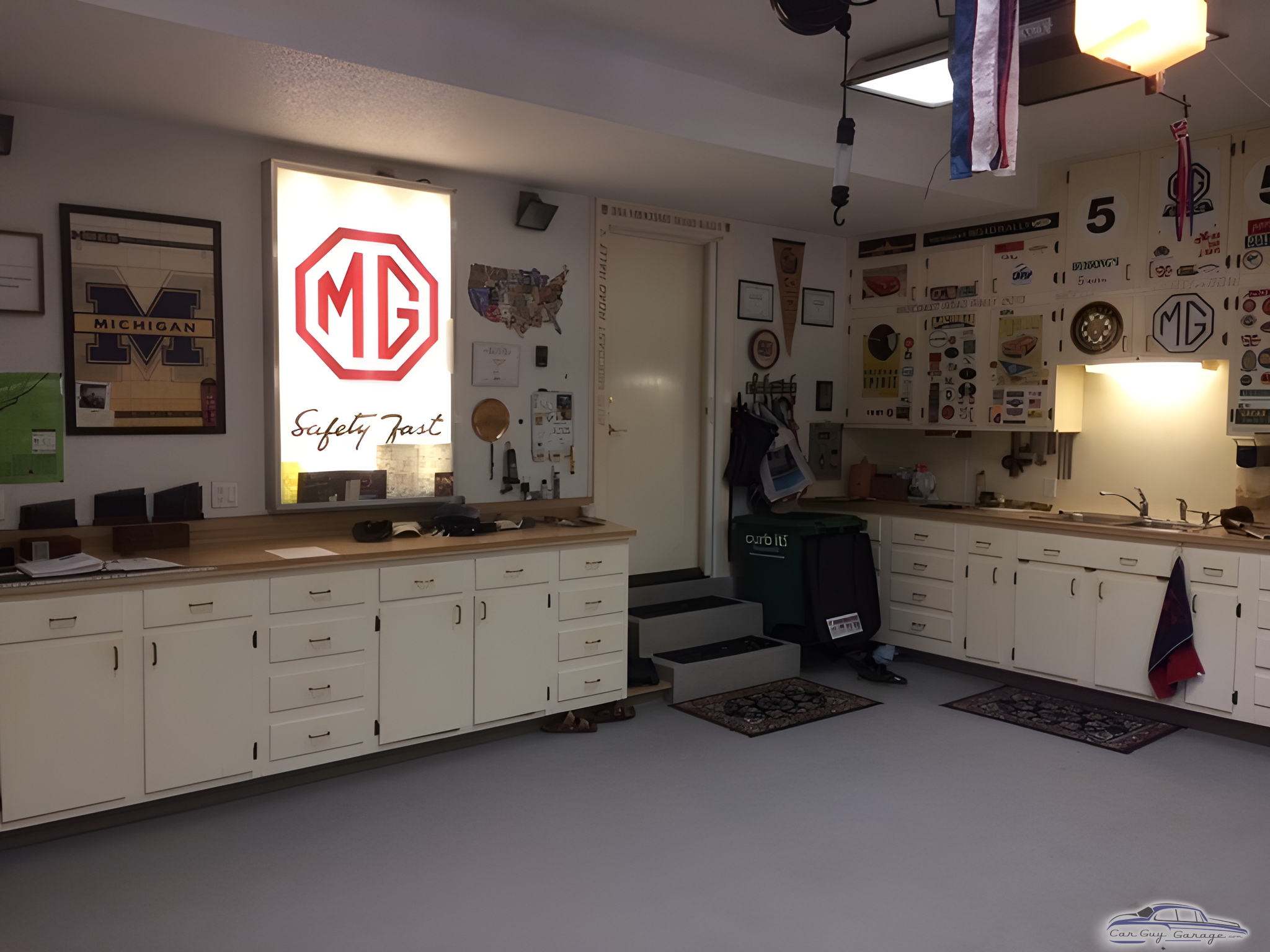 MG Themed Garage with White Cabinets and Wall Decor - Lon from West Des Moines, IA