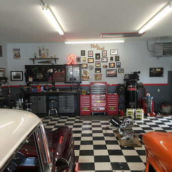Organized garage with toolboxes, workbench, and neon sign - Russ from Billings, MT