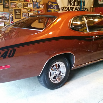 Classic muscle car and wall plaques in garage - Dan from Marion, OH