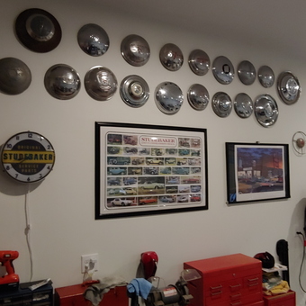 Garage Wall with Hubcap Collection and Studebaker Clock - Bud from LOVELAND, OH