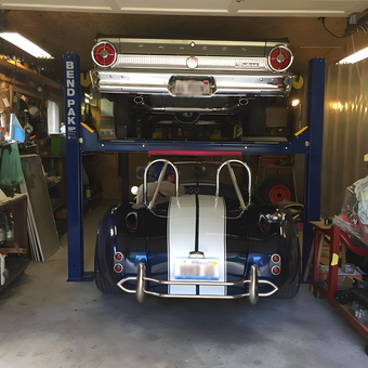 Classic cars on BendPak lift in organized garage - Harold from Peru, IL