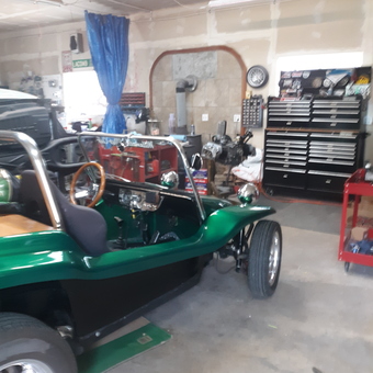 Custom green dune buggy and tool chests in garage - Deb from Lebanon, OR