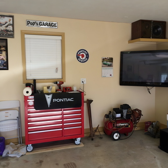 Organized garage with red tool chest and air compressor - David from Elkhart, IN