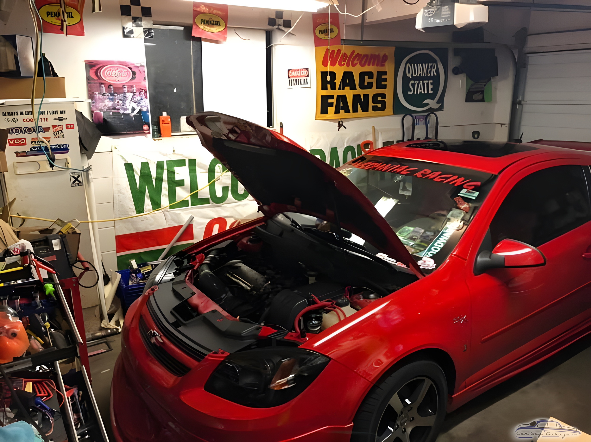 Race Inspired Garage with Red Car and Wall Signs - Gregory from Grand Blanc, MI