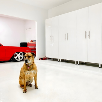 Modern Garage With White Cabinets and Red Tool Chest - Tom