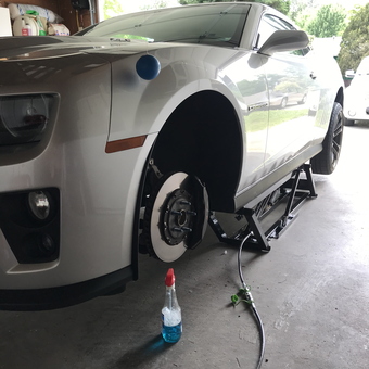 Garage Car Lift with Camaro and Tools - Cebo from Sacramento, CA