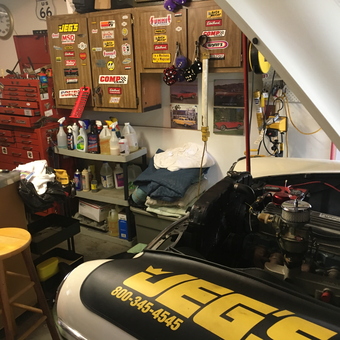 Organized garage with tool chests and car under hood - Don from Delaware, OH