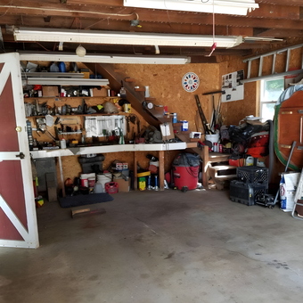 Organized garage with workbench, tools, and storage - Keith from South Milwaukee, WI