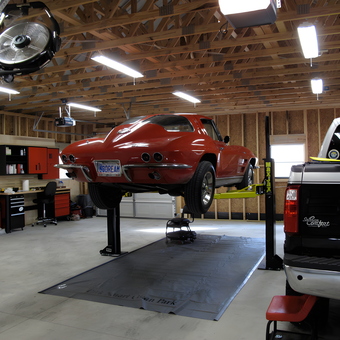 Spacious garage with car lift, tool cabinets, and fan - Dave from Prattville, AL