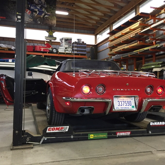Classic Red Corvette on Car Lift in Spacious Garage - Chris from Saint Clair, MI