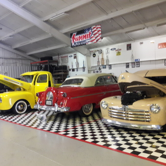 Classic Cars on Checkered Floor with Trophies - Terry from Port Huron, MI