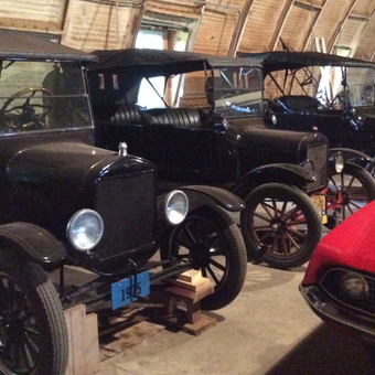 Classic Model T Fords and Red Muscle Car in Garage - Royal from Minneota, MN