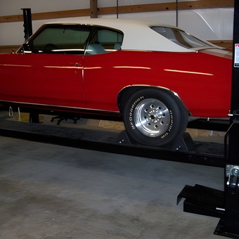 Four post car lift with classic red car - BB4spd. from Winona, TX