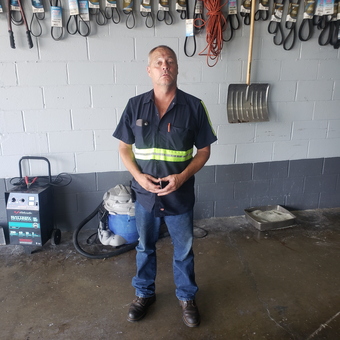 Organized garage with belts, tools, and vacuum - Old man from Cave City, KY