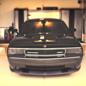 Organized garage with car, motorcycle, bicycle, and cabinets - Brandon from Bakersfield, CA
