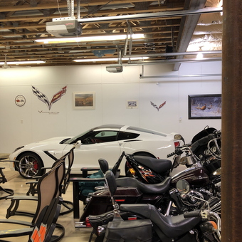 Garage with White Corvette, Motorcycles, and Wall Art - Tom from Pocahontas, IA