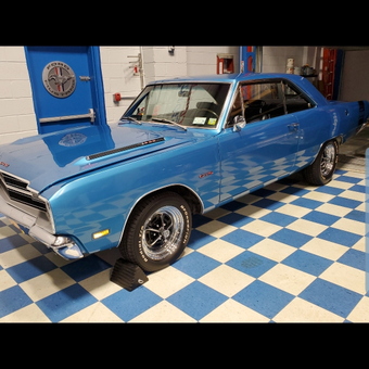 Classic blue muscle car in checkered garage - Jpe from Fair Lawn, NJ