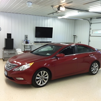 Modern Garage with Wall Storage and TV - Roger from Falconer, NY