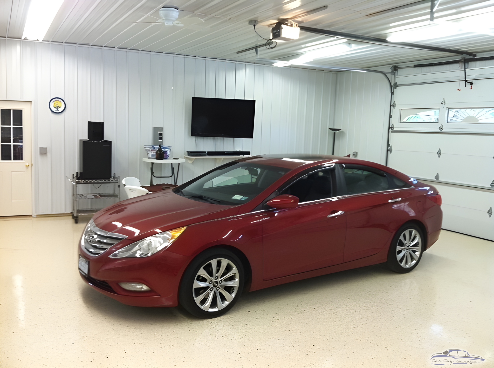 Modern Garage with Wall Storage and TV - Roger from Falconer, NY