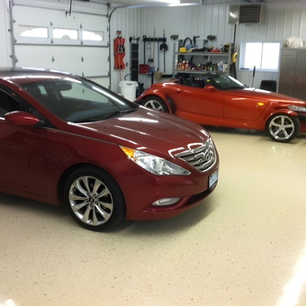Organized Garage with Cars, Storage Cabinets, and Tools - Roger from Falconer, NY