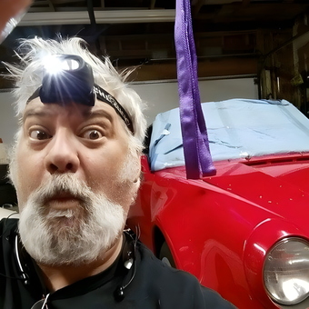 Red Sports Car and Headlamp in Organized Garage - Racerbvd from ORANGE PARK, FL