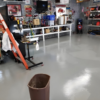 Organized garage with shelving, tools, and decor - Roger from Pensacola, FL