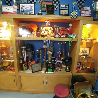 Trophy Display Case with Racing Memorabilia and Awards - Roger from Pensacola, FL