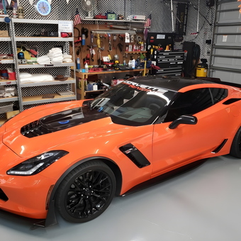 Organized garage with orange Corvette and wall storage - Roger from Pensacola, FL